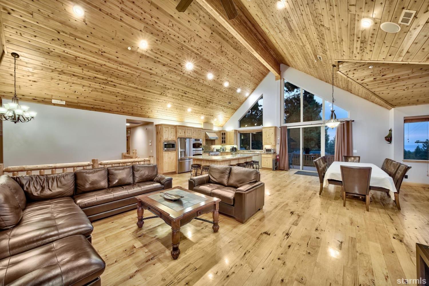 3639 Saddle Road South Lake Tahoe, CA 96150 - Photo 8 of 25 a living room with furniture and a fireplace