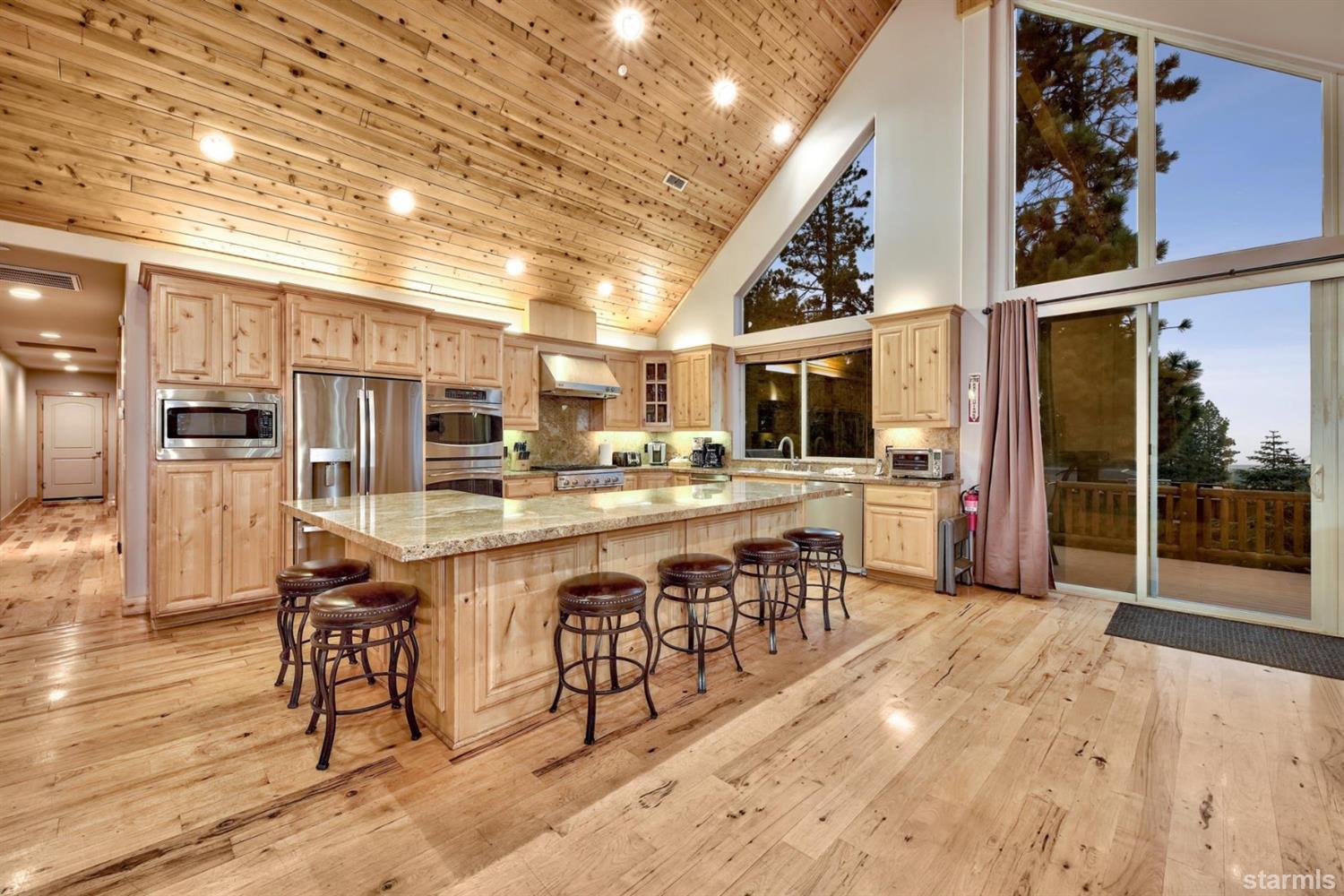 3639 Saddle Road South Lake Tahoe, CA 96150 - Photo 10 of 25 a room with lots of wooden furniture and appliances