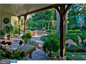 758 Harrison Road Villanova, PA 19085 - Photo 7 of 8 a view of backyard with plants and outdoor seating