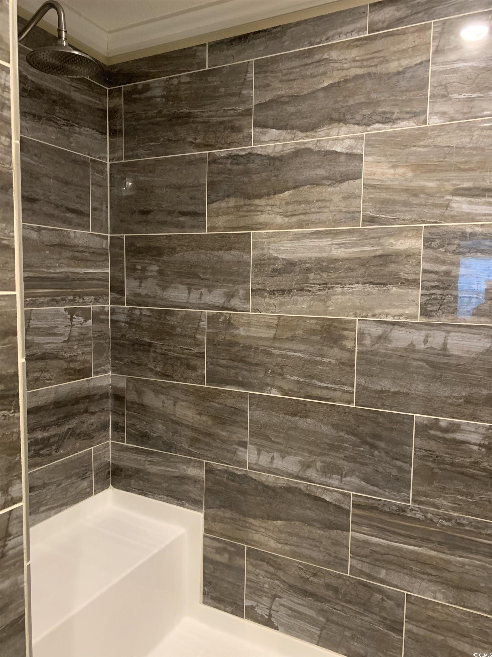 1651 Perry Circle Myrtle Beach, SC 29577 - Photo 21 of 32 Full bath featuring a tile shower