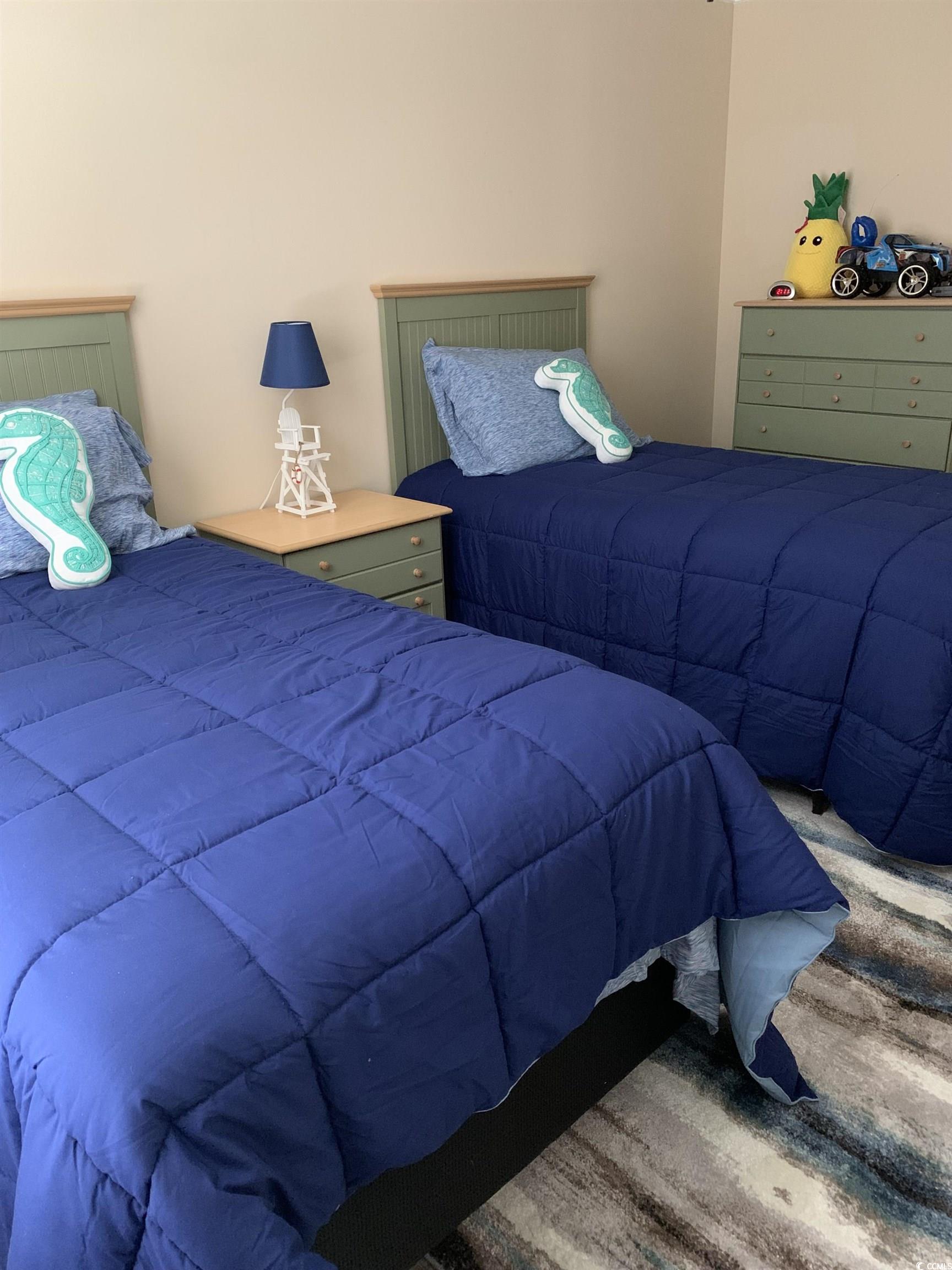 1651 Perry Circle Myrtle Beach, SC 29577 - Photo 26 of 32 Bedroom with carpet flooring