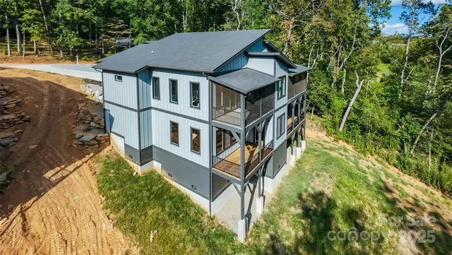 a house with trees in front of it