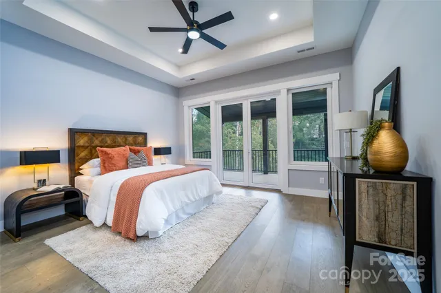 a bedroom with a bed and a lamp