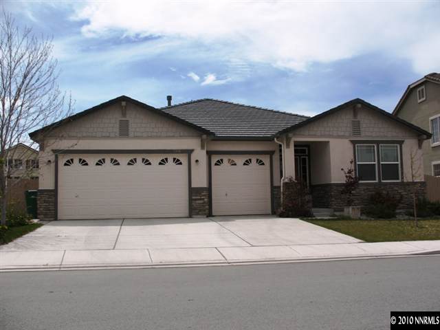 2336 Copper Springs Drive Reno, NV 89521 - Photo 1 of 1 a front view of a house with a garage