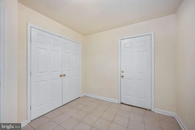 a bathroom with a tub and shower