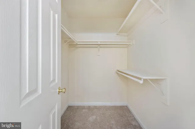 a backyard of a house with wooden fence