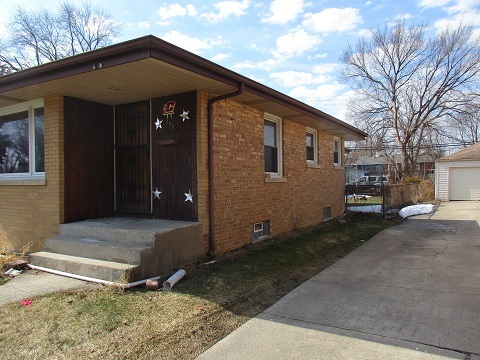 332 North Wolf Road Hillside, IL 60162 - Photo 2 of 16 a front view of a house with a yard