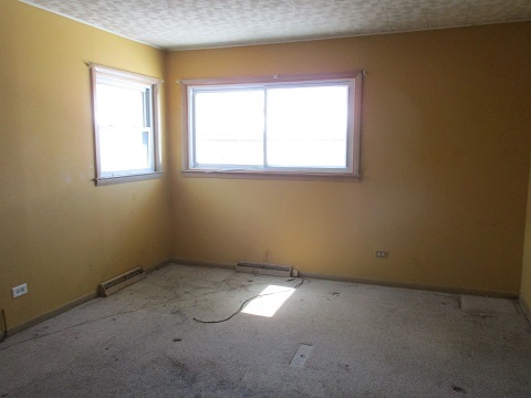 332 North Wolf Road Hillside, IL 60162 - Photo 12 of 16 an empty room with a window