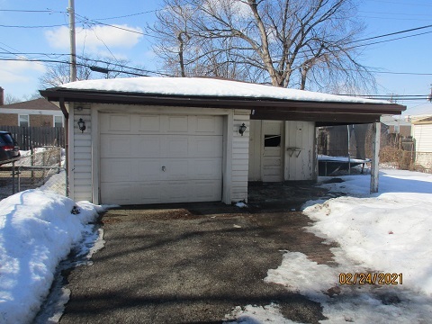 332 North Wolf Road Hillside, IL 60162 - Photo 15 of 16 a view of a house with a garage