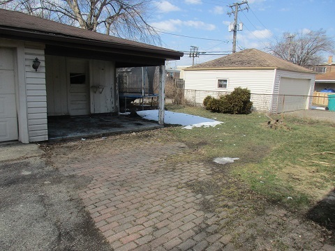 332 North Wolf Road Hillside, IL 60162 - Photo 16 of 16 a view of a house with a garage