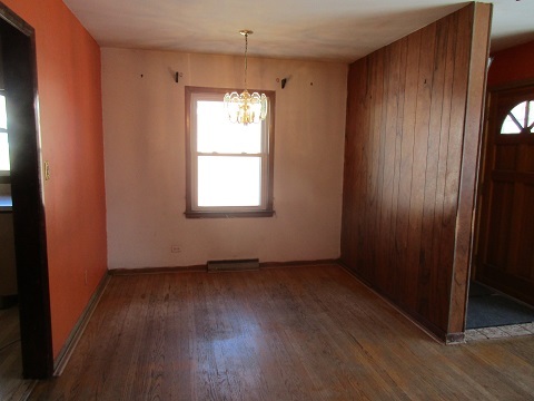 332 North Wolf Road Hillside, IL 60162 - Photo 5 of 16 an empty room with wooden floor and windows