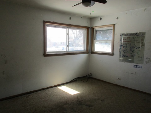 332 North Wolf Road Hillside, IL 60162 - Photo 9 of 16 a view of an empty room with a window
