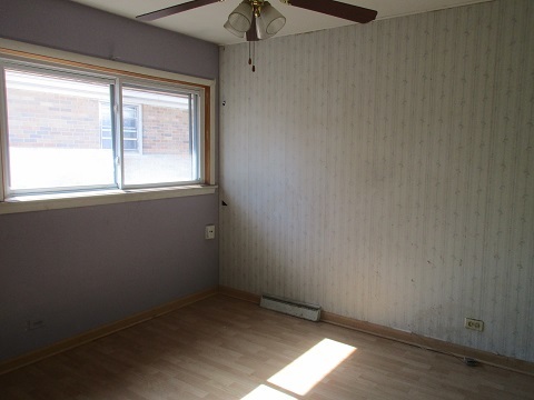 332 North Wolf Road Hillside, IL 60162 - Photo 10 of 16 an empty room with a window