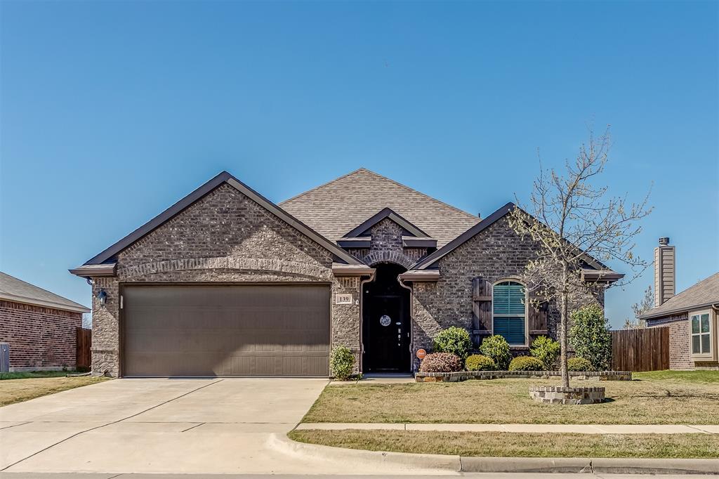 139 Acadia Lane Forney, TX 75126 - Photo 1 of 1 a view of a white house with iron fence