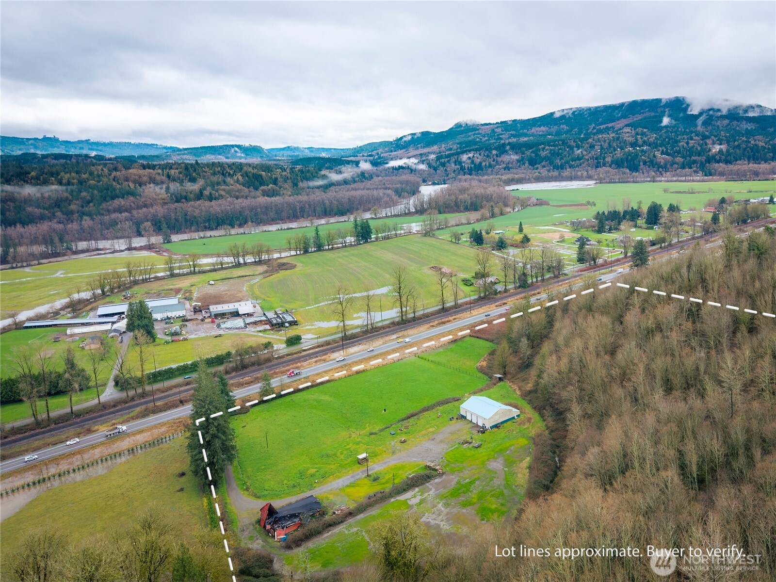 29429 Highway 2 Monroe, WA 98272 - Photo 3 of 9 a view of a lake with a mountain
