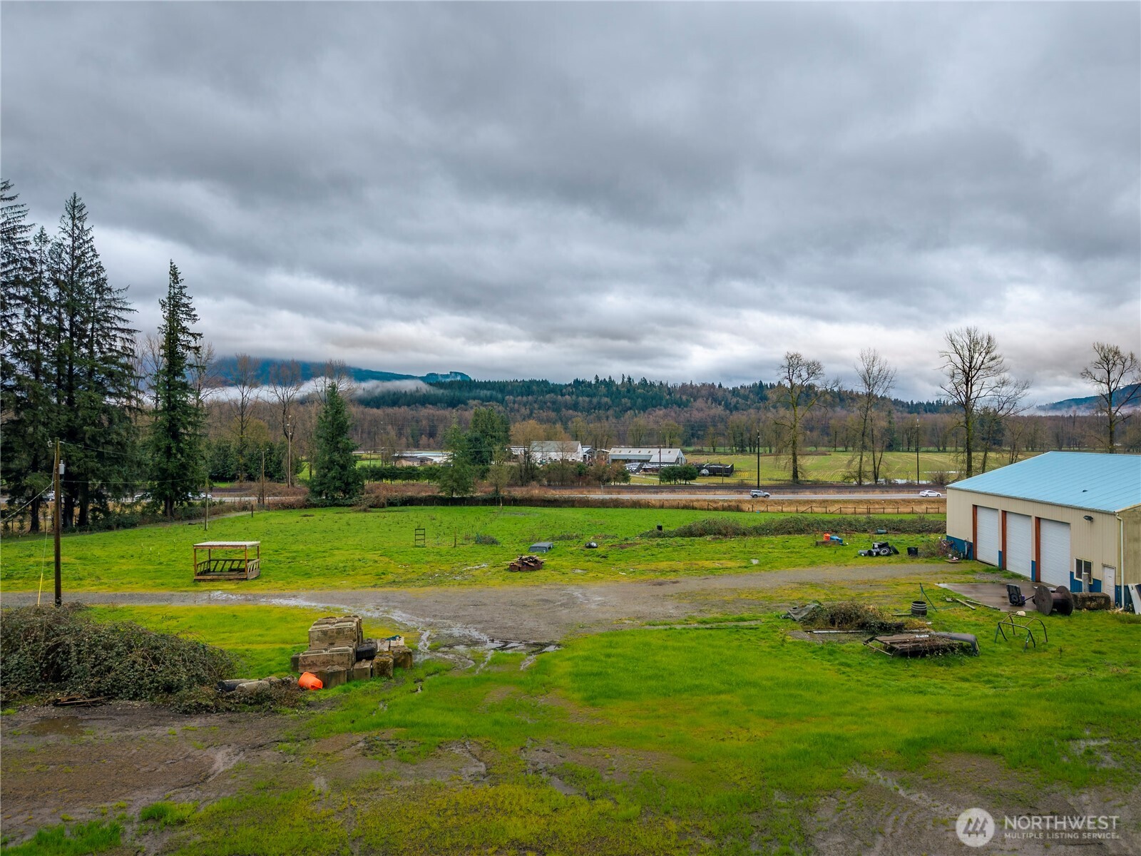 29429 Highway 2 Monroe, WA 98272 - Photo 8 of 9 a view of a big yard with a fountain and a big yard
