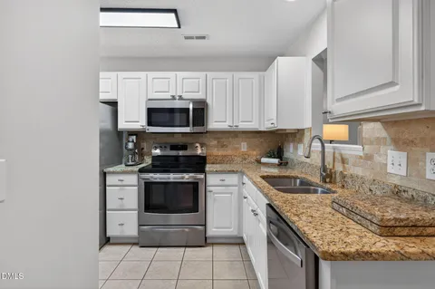 $255,000 | 2400 Huntscroft Lane, Unit 202, Raleigh, NC 27617