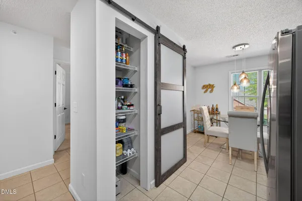 $255,000 | 2400 Huntscroft Lane, Unit 202, Raleigh, NC 27617