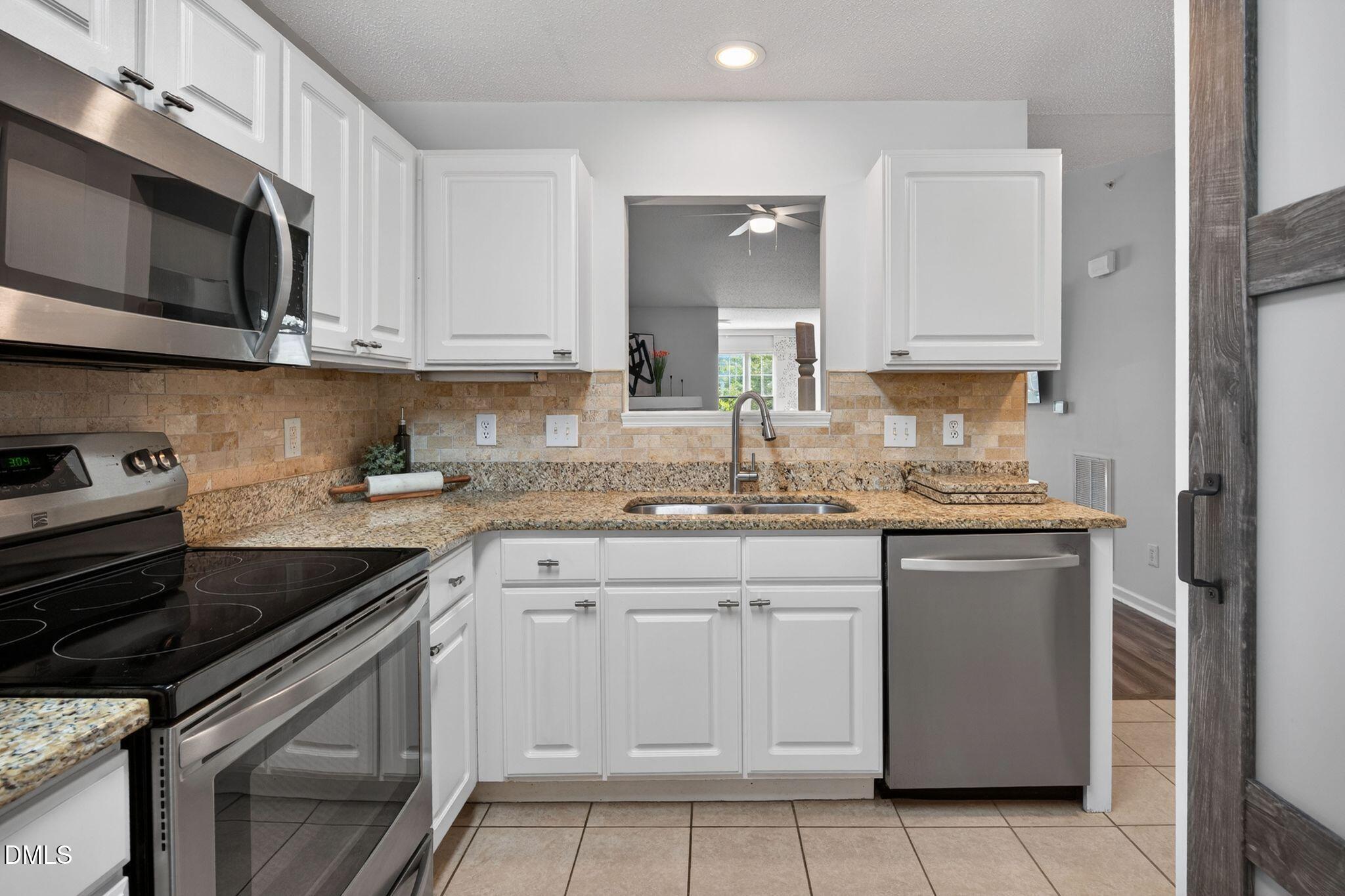 2400 Huntscroft Lane, Unit 202 Raleigh, NC 27617 - Photo 16 of 49 030-kitchen