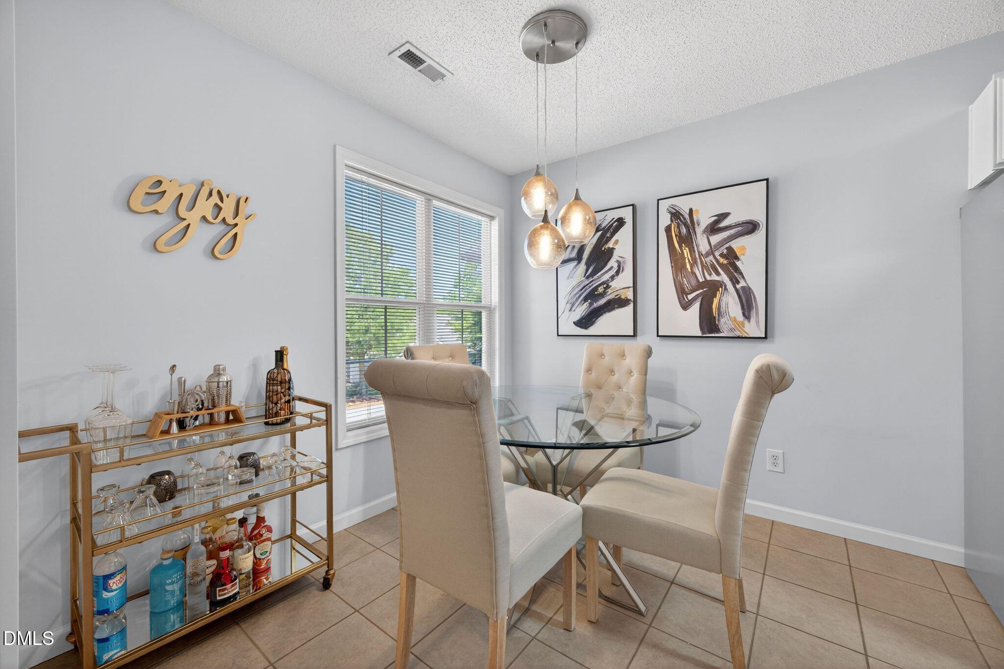 2400 Huntscroft Lane, Unit 202 Raleigh, NC 27617 - Photo 17 of 49 031-dining-room