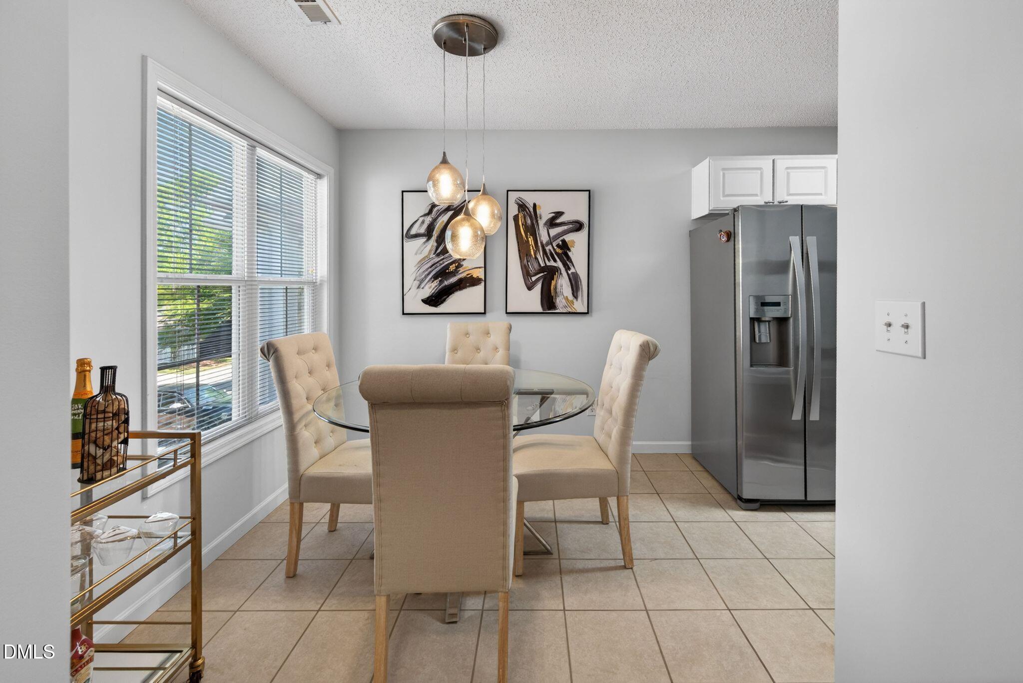 2400 Huntscroft Lane, Unit 202 Raleigh, NC 27617 - Photo 18 of 49 032-dining-room