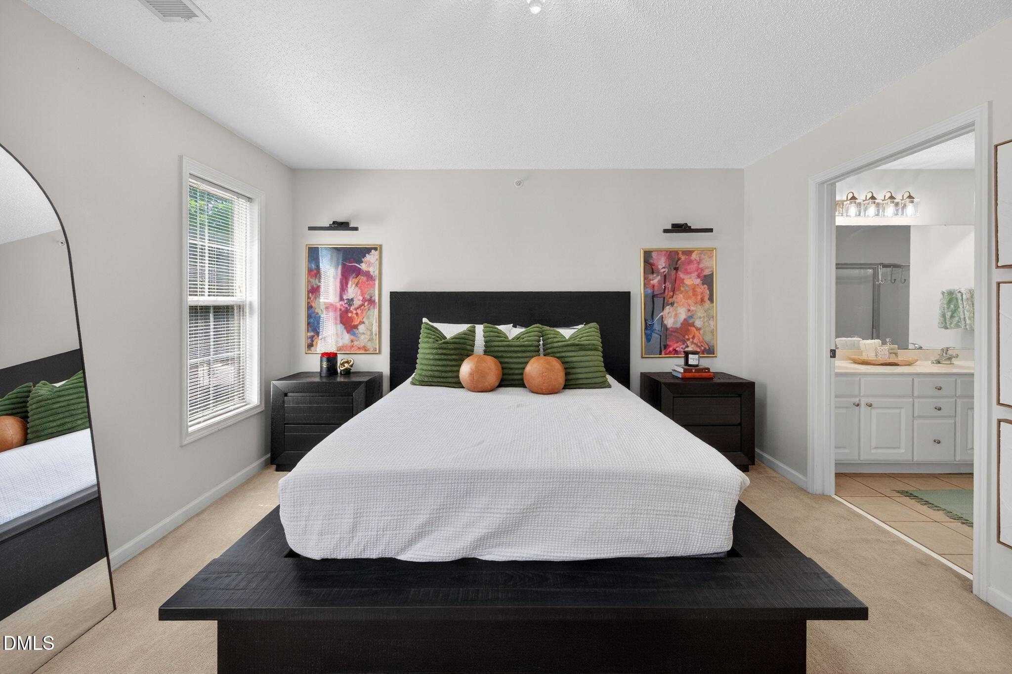 2400 Huntscroft Lane, Unit 202 Raleigh, NC 27617 - Photo 30 of 49 Primary Bedroom