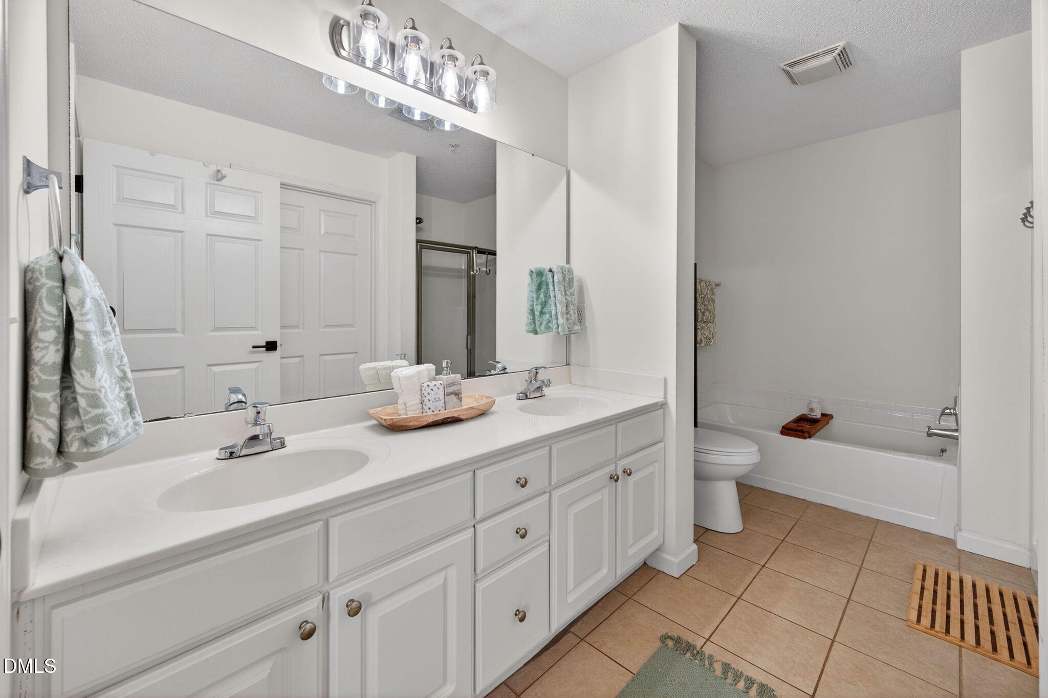 2400 Huntscroft Lane, Unit 202 Raleigh, NC 27617 - Photo 34 of 49 037-primary-bathroom