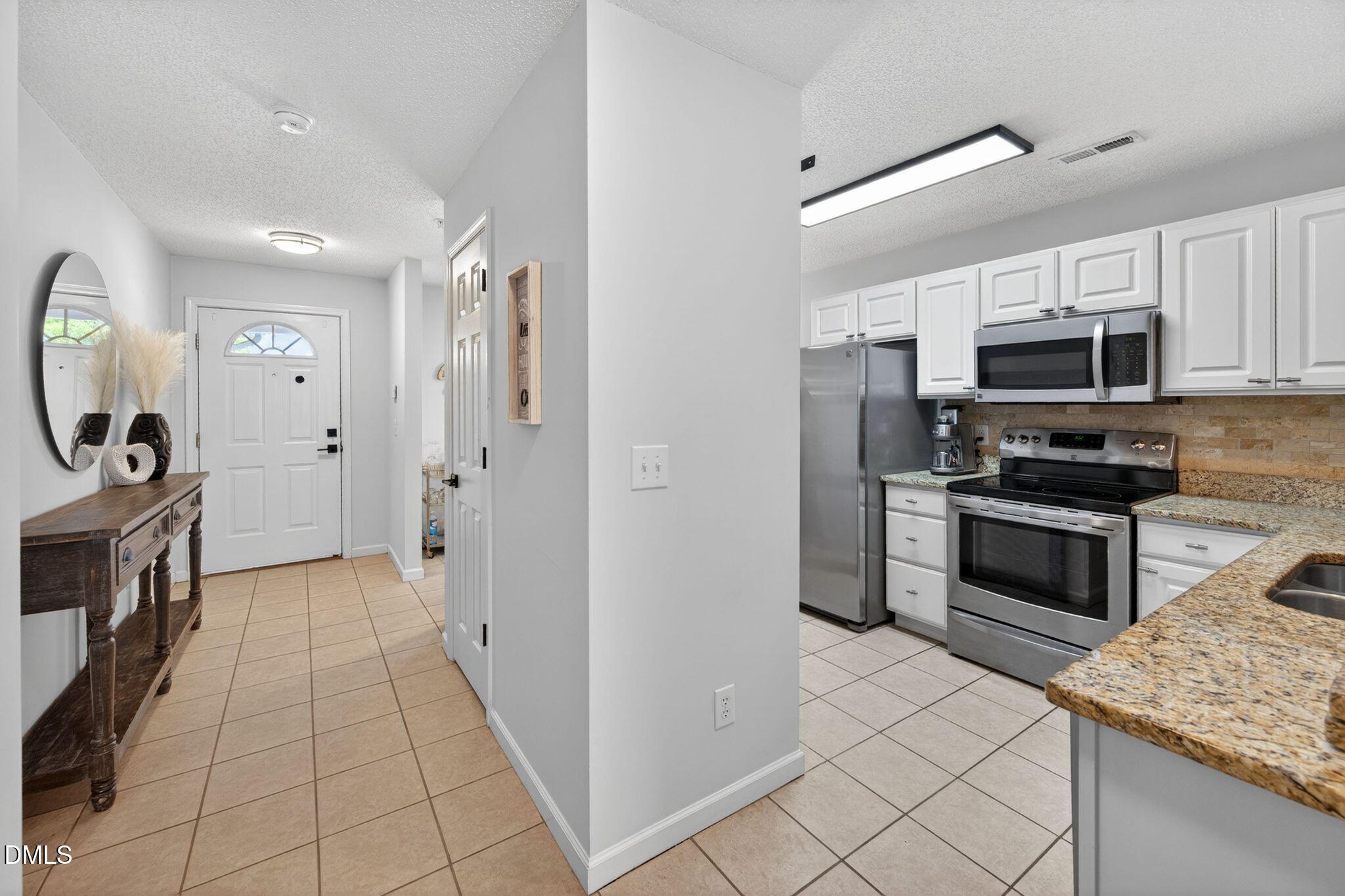 2400 Huntscroft Lane, Unit 202 Raleigh, NC 27617 - Photo 6 of 49 020-foyer