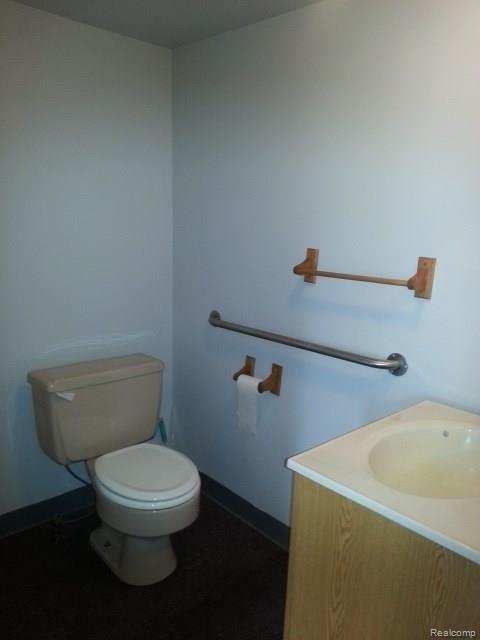5179 Stevens Road Clarkston, MI 48346 - Photo 12 of 21 garage half bath.jpg