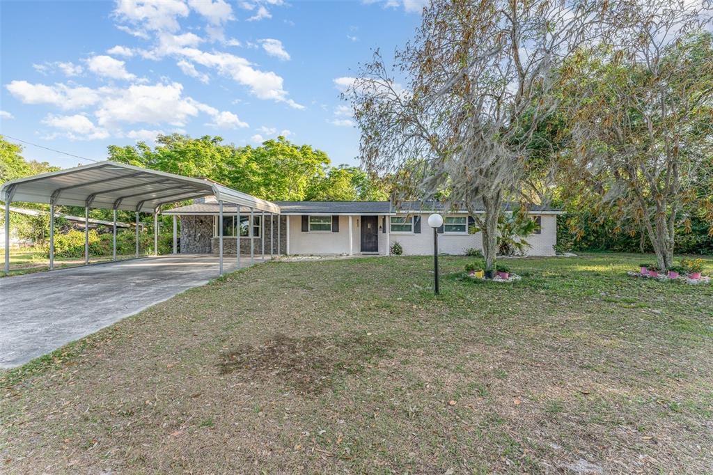 803 Mc Craine Road Lakeland, FL 33809 - Photo 1 of 1 a view of a house with a yard