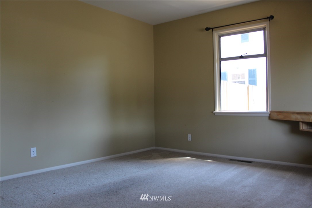 216 Garden Avenue North Renton, WA 98057 - Photo 3 of 38 an empty room with a window