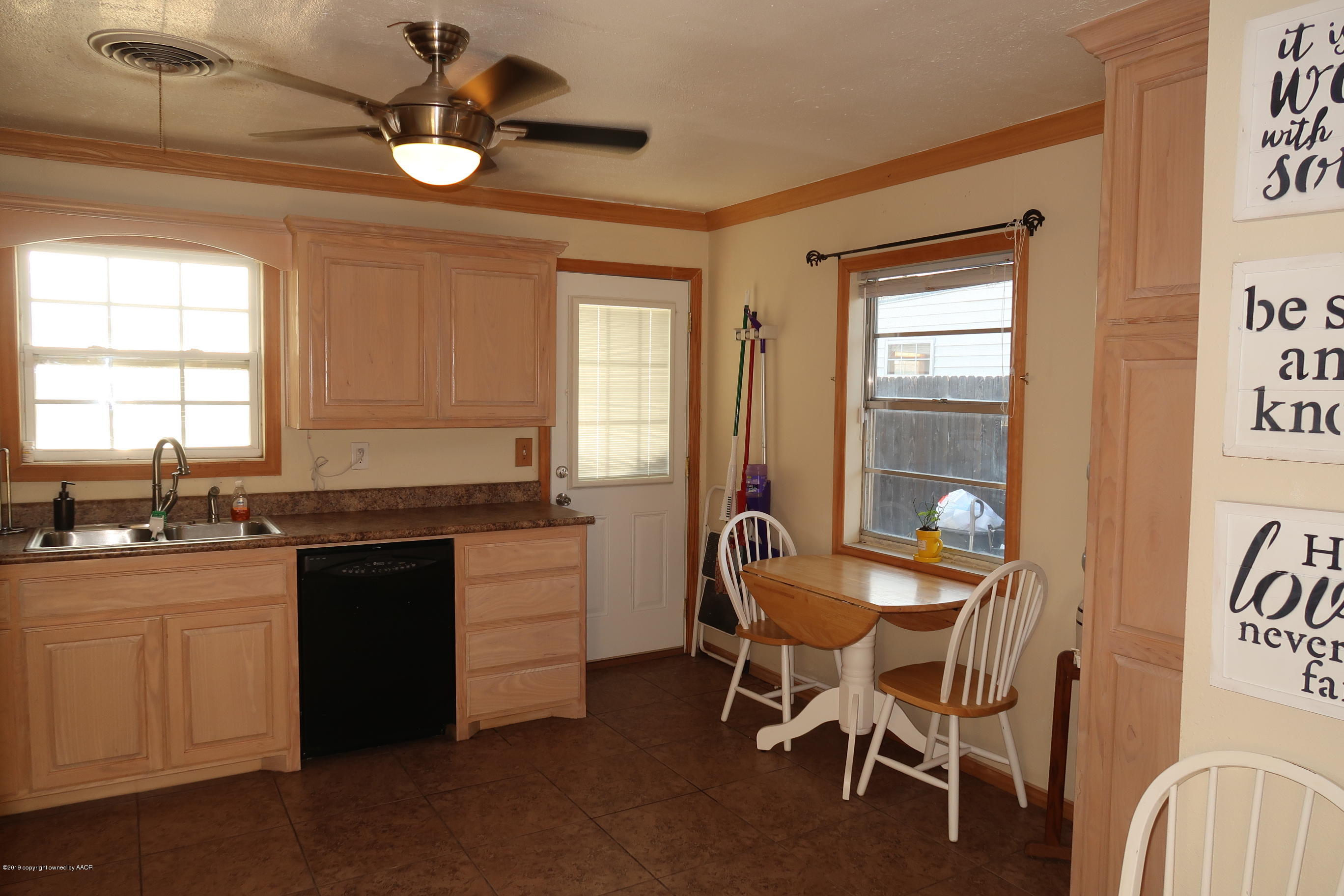 4628 South Bonham Street Amarillo, TX 79110 - Photo 7 of 22 a kitchen with a sink and stove
