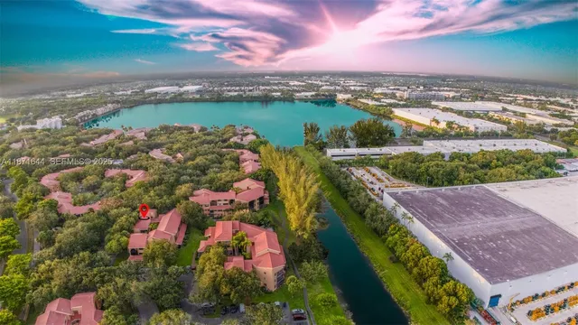 an aerial view of lake residential houses with outdoor space and lake view