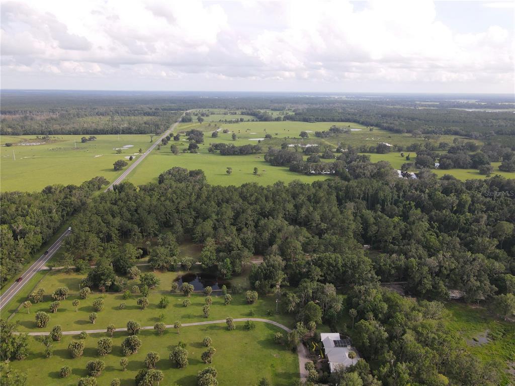 15208 Southwest Williston Road Archer, FL 32618 - Photo 9 of 44 a view of a city with an ocean