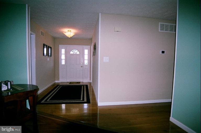 2196 Patapsco Road Finksburg, MD 21048 - Photo 22 of 30 Entry foyer 12x7 ft, hrd wd, side light panel door