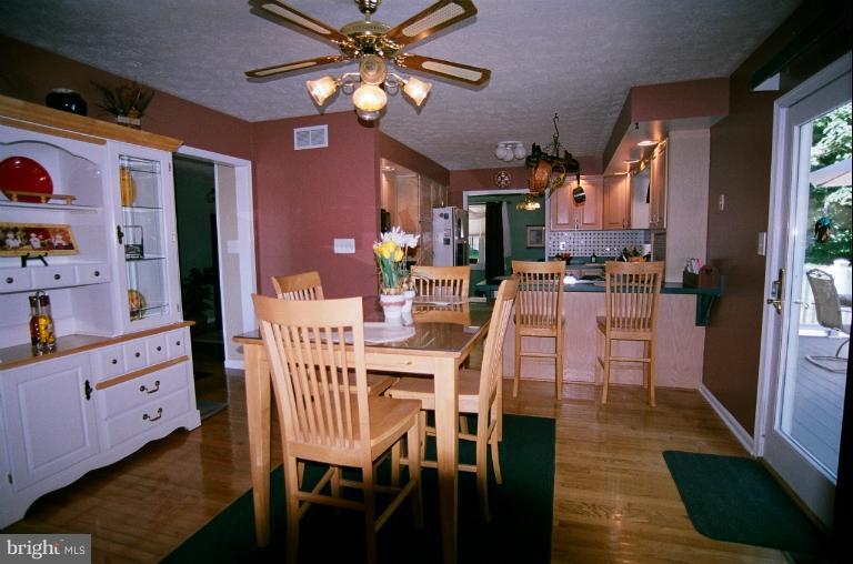 2196 Patapsco Road Finksburg, MD 21048 - Photo 4 of 30 Eat-in table space, brk-fst bar, exit to deck