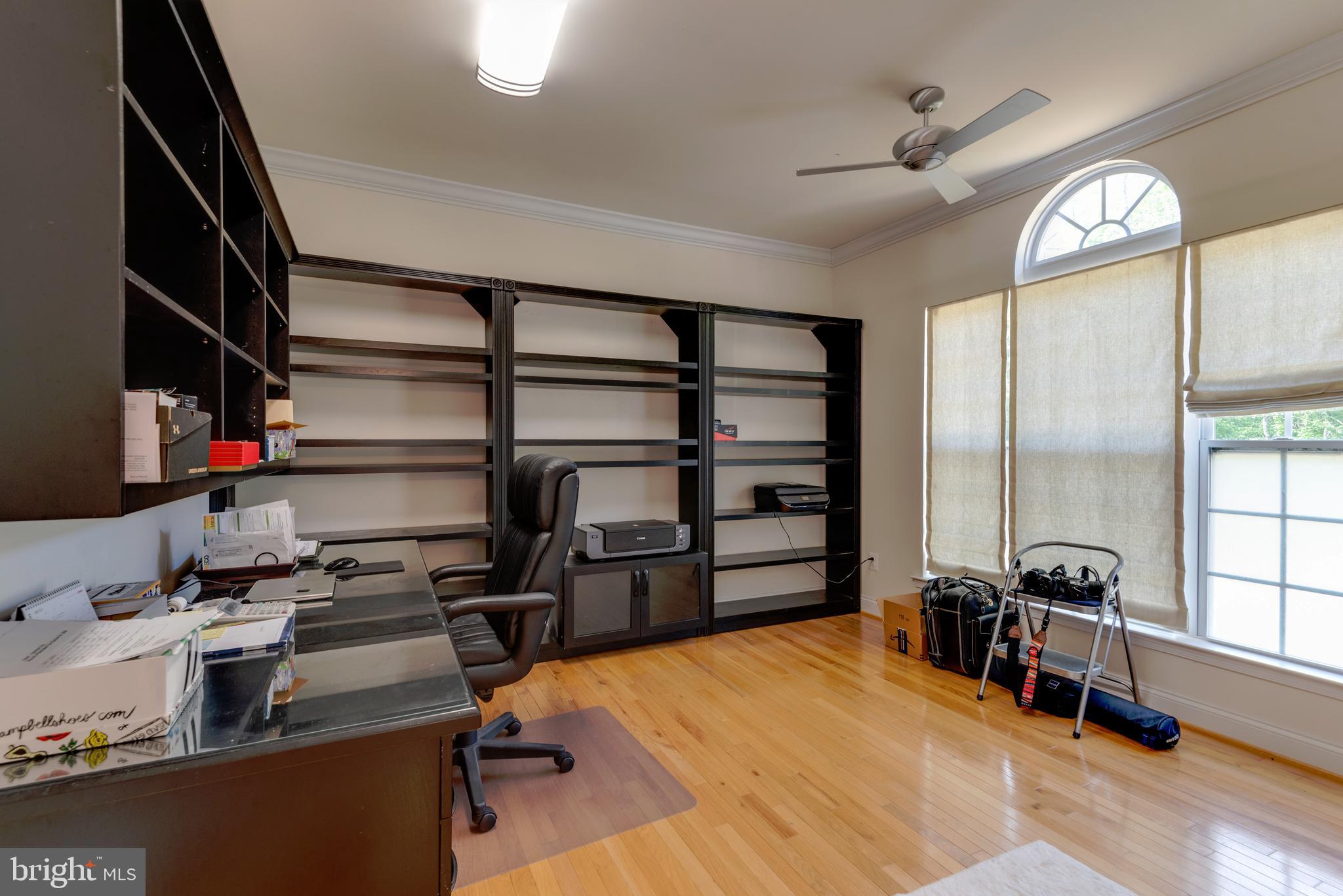 3740 Leitches Wharf Road Prince Frederick, MD 20678 - Photo 13 of 45 Office has a desk and built-in shelves that convey