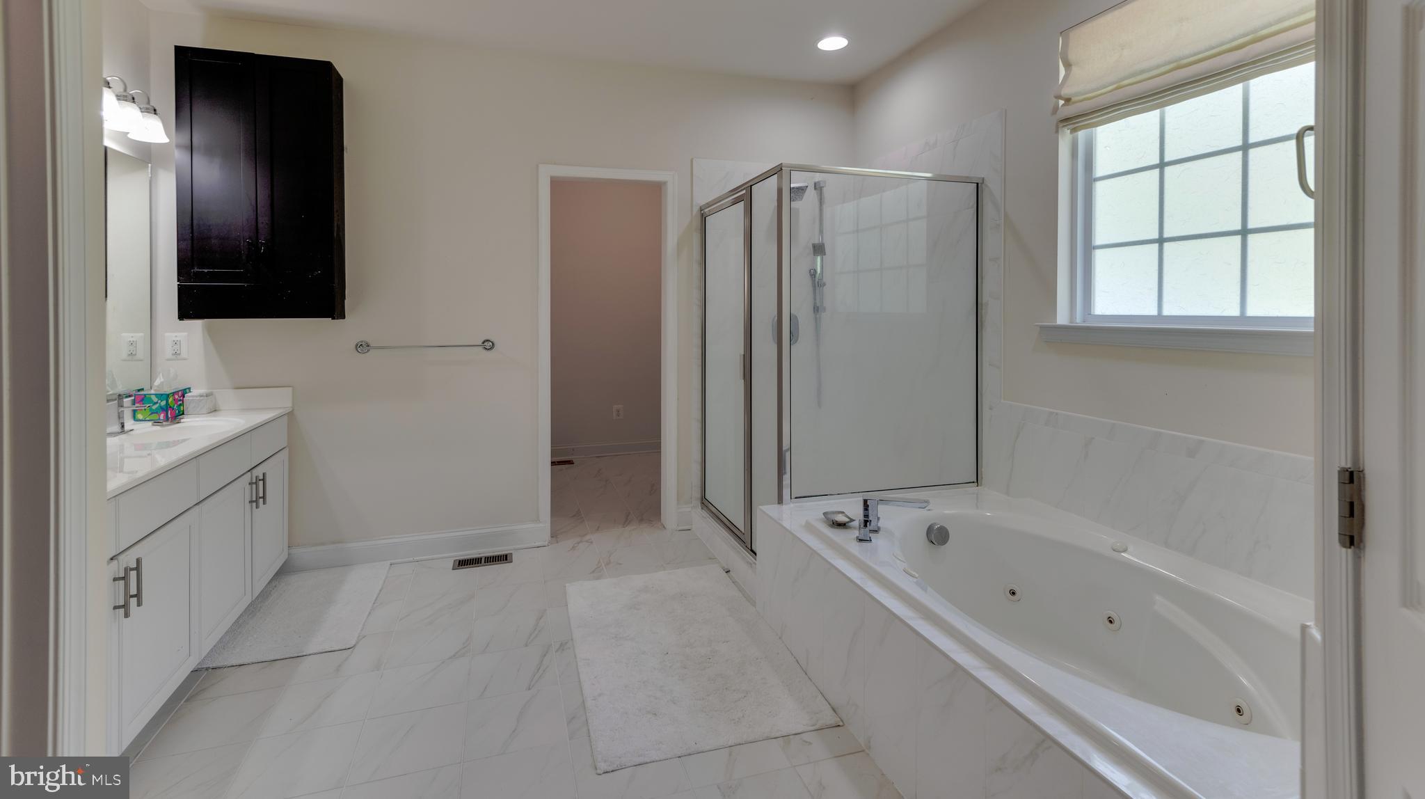 3740 Leitches Wharf Road Prince Frederick, MD 20678 - Photo 17 of 45 Owner's Bath with jetted tub & shower.