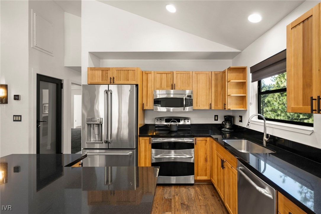 759 Judith Court Incline Village, NV 89451 - Photo 13 of 36 a kitchen with stainless steel appliances a refrigerator sink and cabinets
