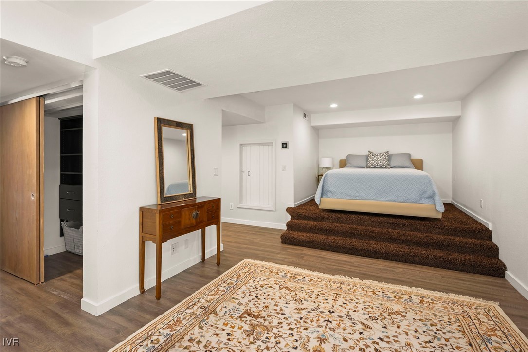 759 Judith Court Incline Village, NV 89451 - Photo 20 of 36 a spacious bedroom with a bed and a dresser