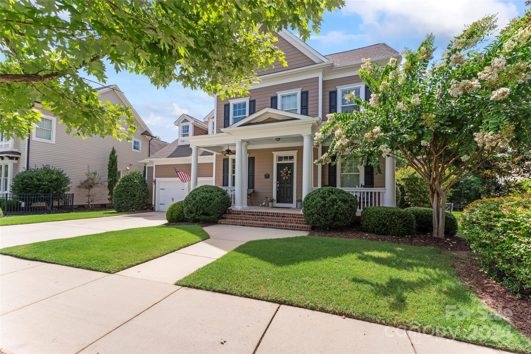 6059 Daphne Circle Fort Mill, SC 29708 - Photo 3 of 48 a front view of a house with a yard