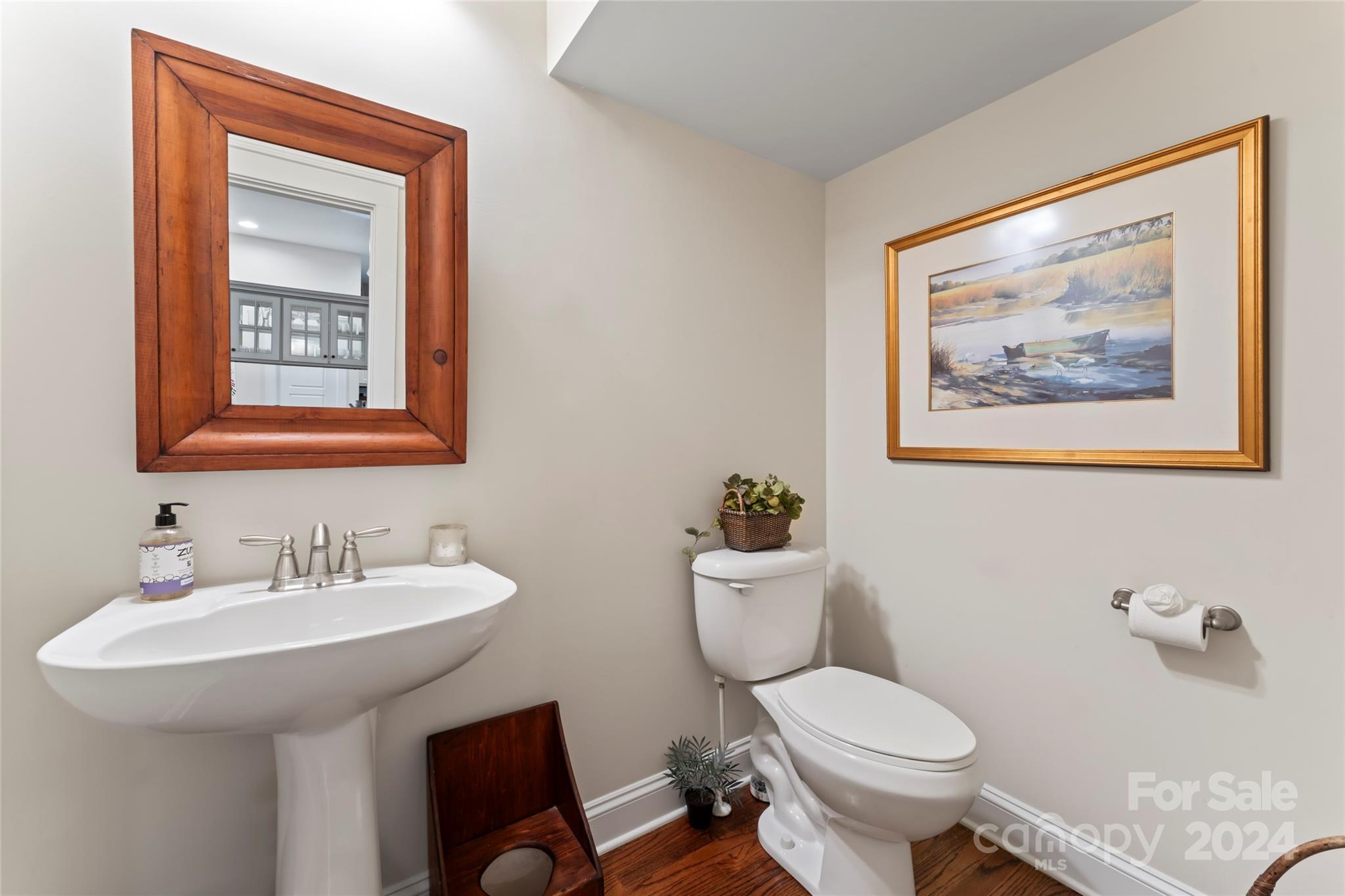 6059 Daphne Circle Fort Mill, SC 29708 - Photo 37 of 48 a bathroom with a toilet a sink and mirror