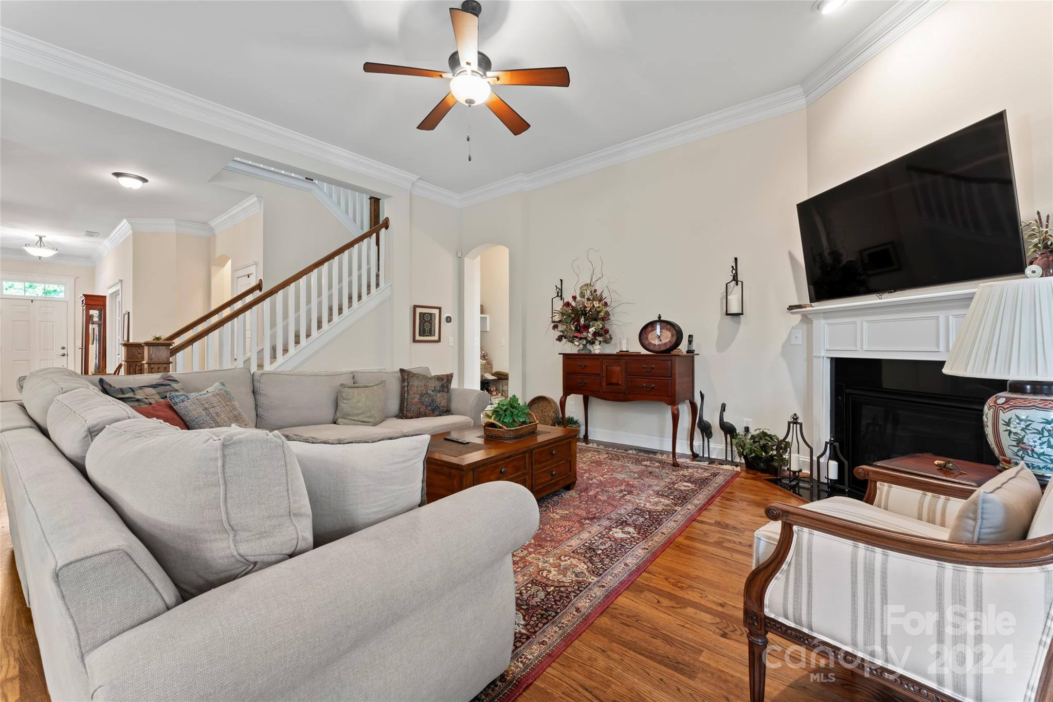 6059 Daphne Circle Fort Mill, SC 29708 - Photo 8 of 48 a living room with furniture fireplace and a flat screen tv