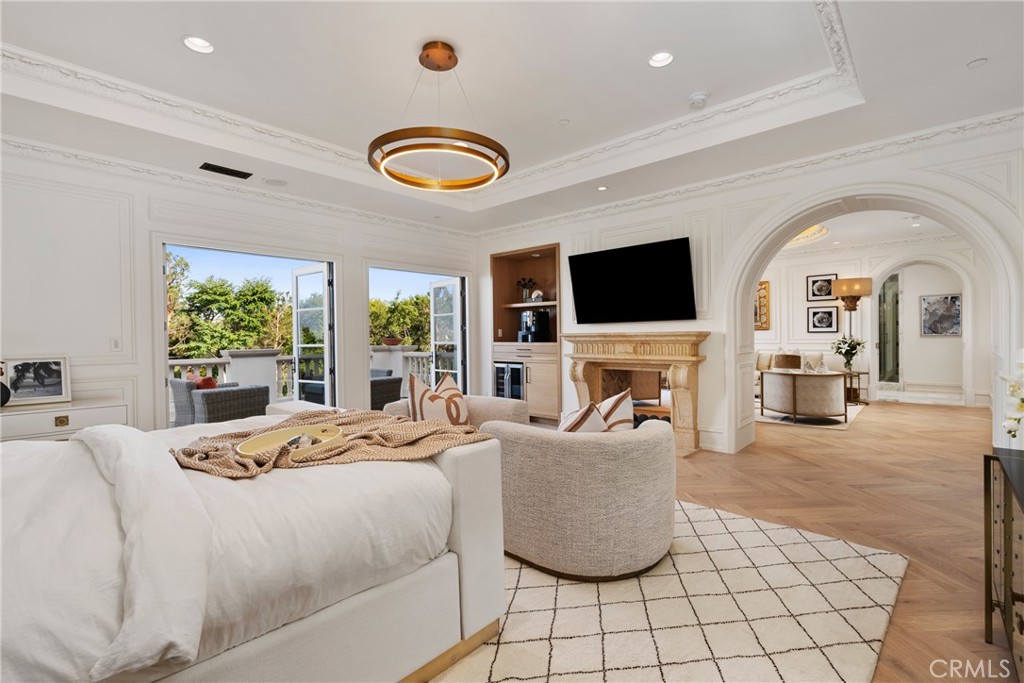 22 Deep Sea Newport Coast, CA 92657 - Photo 28 of 57 a bedroom with a bed and a flat screen tv