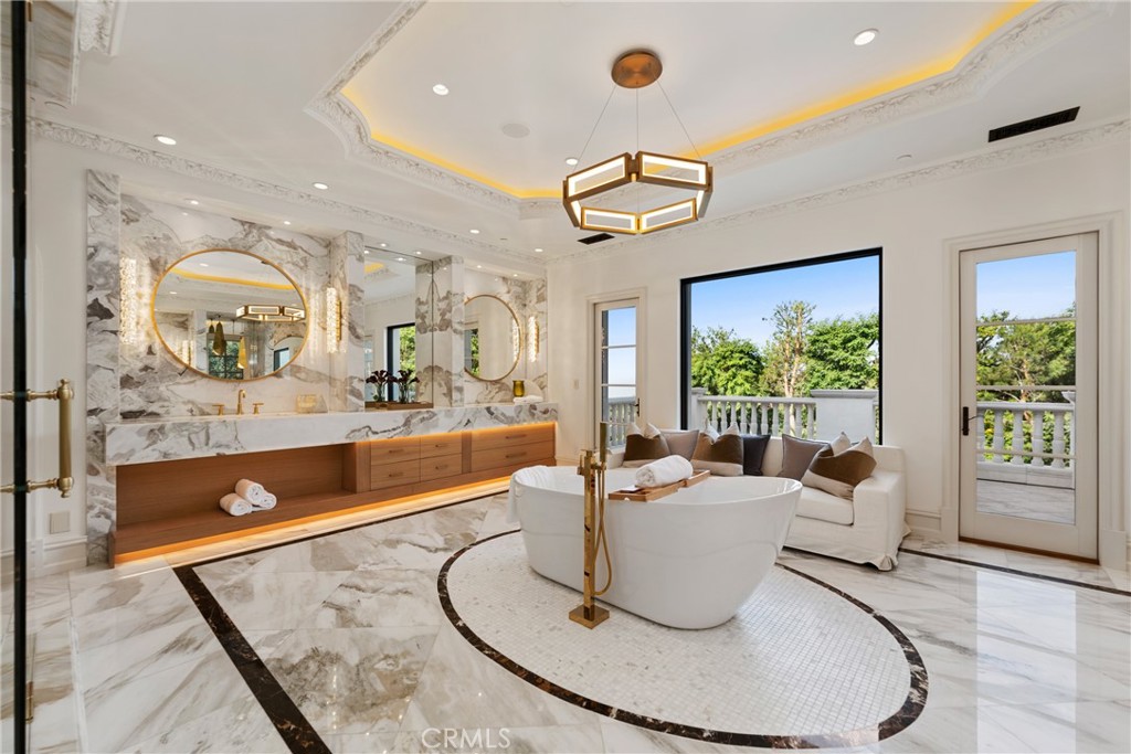22 Deep Sea Newport Coast, CA 92657 - Photo 29 of 57 a living room with large window and dining table