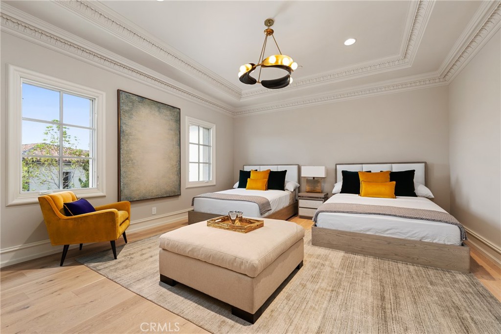 22 Deep Sea Newport Coast, CA 92657 - Photo 35 of 57 a bedroom with two beds and a potted plant