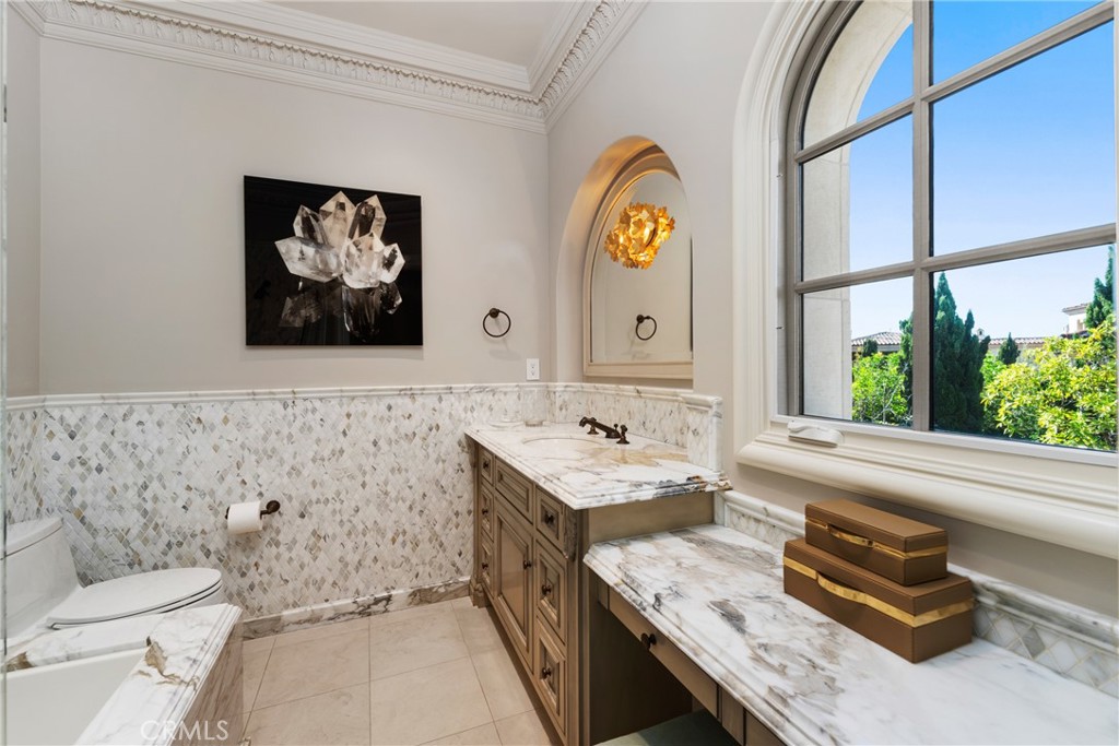 22 Deep Sea Newport Coast, CA 92657 - Photo 36 of 57 a bathroom with a sink and a bathtub