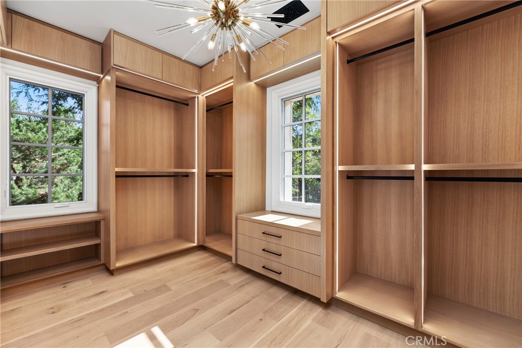 22 Deep Sea Newport Coast, CA 92657 - Photo 38 of 57 a view of an empty room with a window and wooden floor