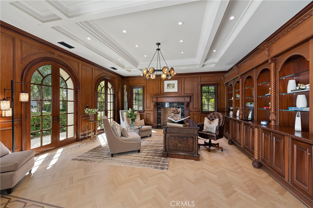 22 Deep Sea Newport Coast, CA 92657 - Photo 42 of 57 a living room with furniture a chandelier and a large window