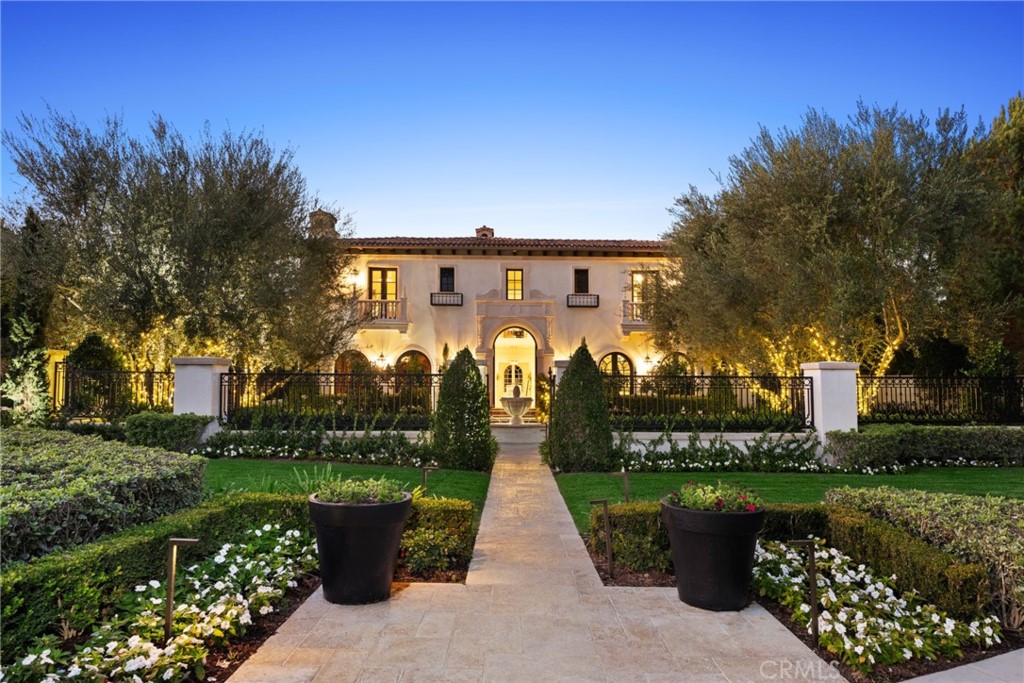 22 Deep Sea Newport Coast, CA 92657 - Photo 55 of 57 front view of a house with a garden